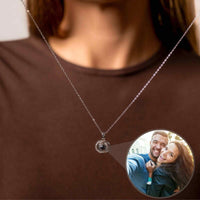 Thumbnail for Duo Photo Necklace by Brother & Sisters featuring customizable projection pendant displaying a couple's photo.
