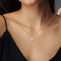 Thumbnail for Flower Initial Necklace showcasing floral design and gold elegance worn by a woman, from Brother & Sisters.