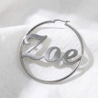 Thumbnail for Custom Name Hoop Earrings in Silver, macro detail of the metal and the finish | SKU: name-hoop-silver-30-mm