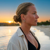 Thumbnail for Everyday Waterproof Hoops in Silver, worn on the beach | SKU: 41001-silver