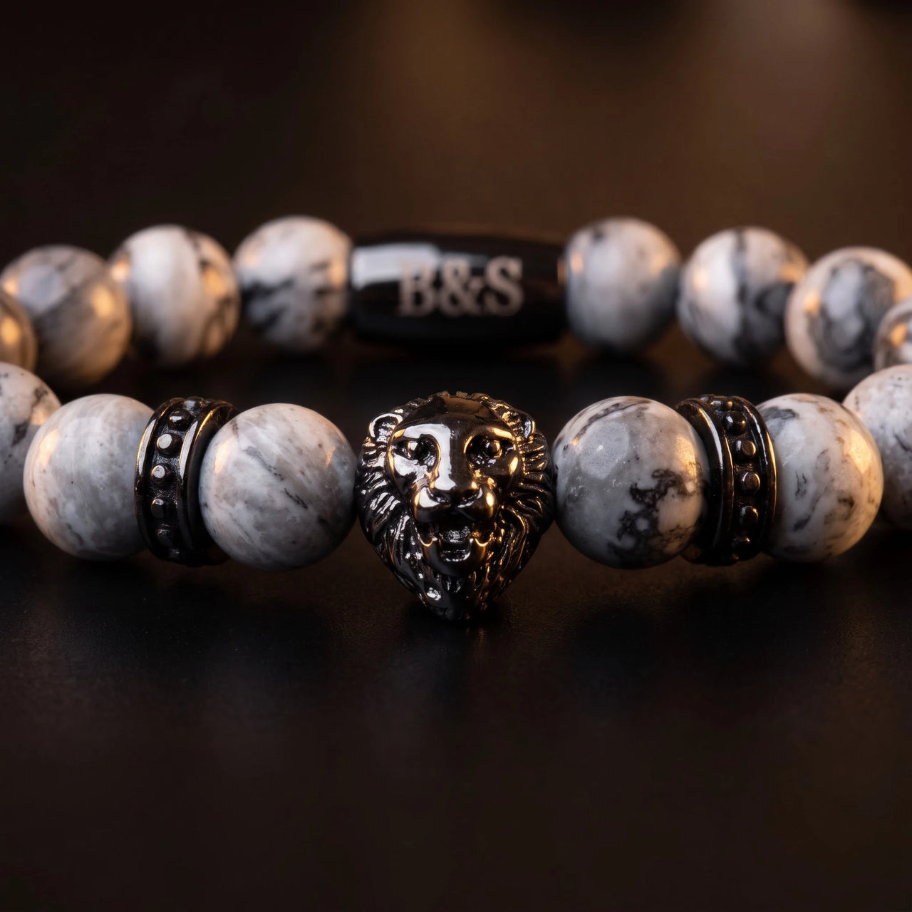 Black Lion & Grey Stones Bracelet – macro detail of the lion head | Brother & Sisters | SKU: 20866222-gun-black-XS-14-15, 20866222-gun-black-S-16-17, 20866222-gun-black-M-18-19, 20866222-gun-black-L-20-21, 20866222-gun-black-XL-22-23