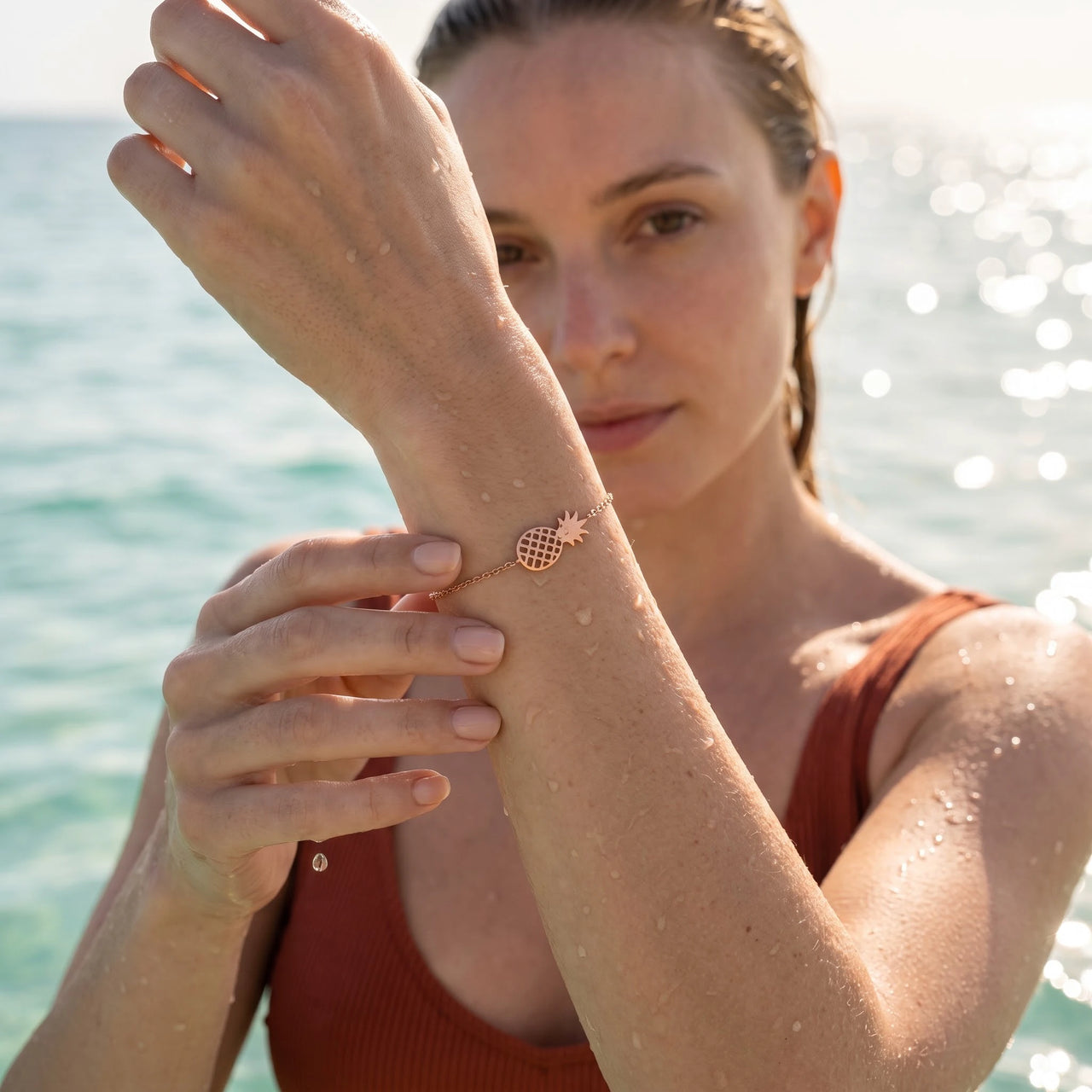 Rose gold charm bracelet worn in the sea, waterproof stainless steel with water drops | SKU: 9178613-rose-gold