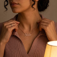 Thumbnail for Minimalist Name Necklace in rose gold held at the neckline with both hands, the name Talia | SKU: minimalistnn-rosegold