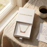 Thumbnail for Minimalist Name Necklace in rose gold in its Brother & Sisters gift box with a handwritten card, the name Farah | SKU: minimalistnn-rosegold