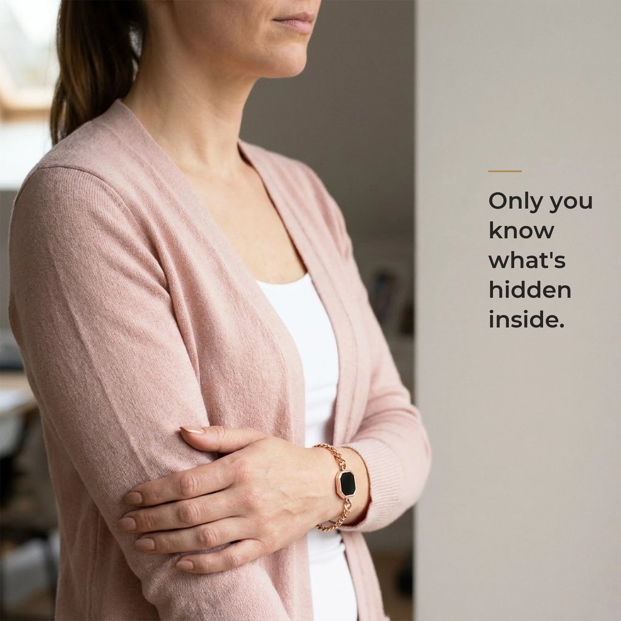Woman wearing the rose gold bracelet with its black octagon charm, only she knows the photo inside | SKU: TPH-OCTB-ROSEGOLD-18
