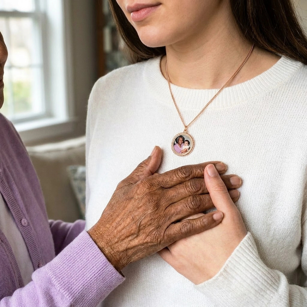 Grandmother's hand on her granddaughter's, the rose gold round photo necklace with their photo | SKU: TPH-RNDN-ROSEGOLD