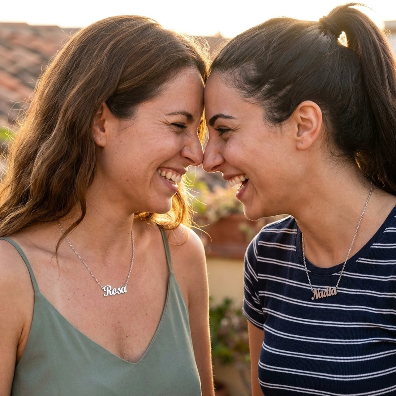 Minimalist Name Necklace in silver worn by two women laughing together, the name Rosa and Nadia | SKU: minimalistnn-silver